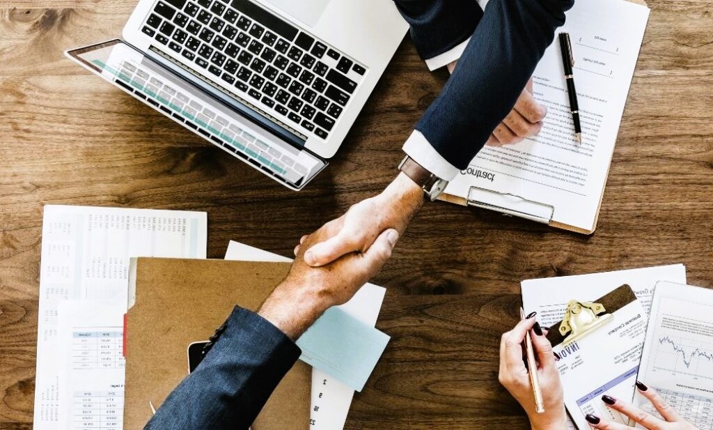 Handshake at the conclusion of an agreement